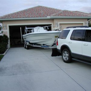 Son_backing_boat_into_garage_for_the_1st_time_4_19_2005_2.jpg