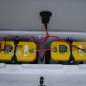Fwd_battery_box_with_50amp_breaker_and_dual_D31T_optimas_third_one_is_in_the_aft_battery_box.JPG