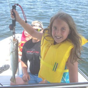 Emily_s_first_20_inch_trout_on_Uncle_B_s_boat.jpg