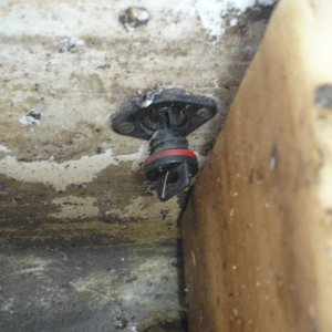 Black_plastic_Hull_drain_in_bilge_close_up.jpg