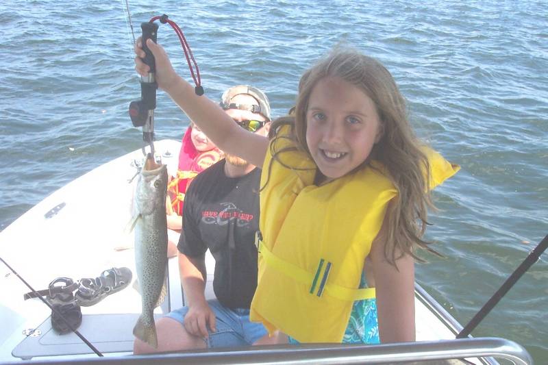 Emily_s_first_20_inch_trout_on_Uncle_B_s_boat.jpg